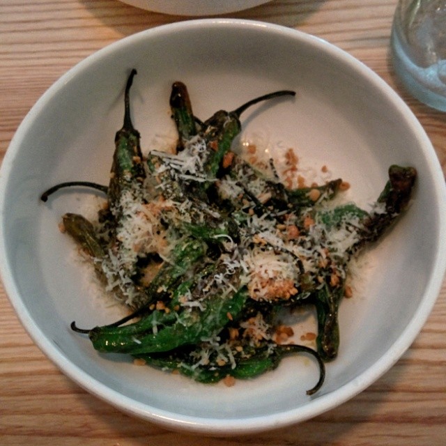 Shishito peppers with parmesan and pine nuts